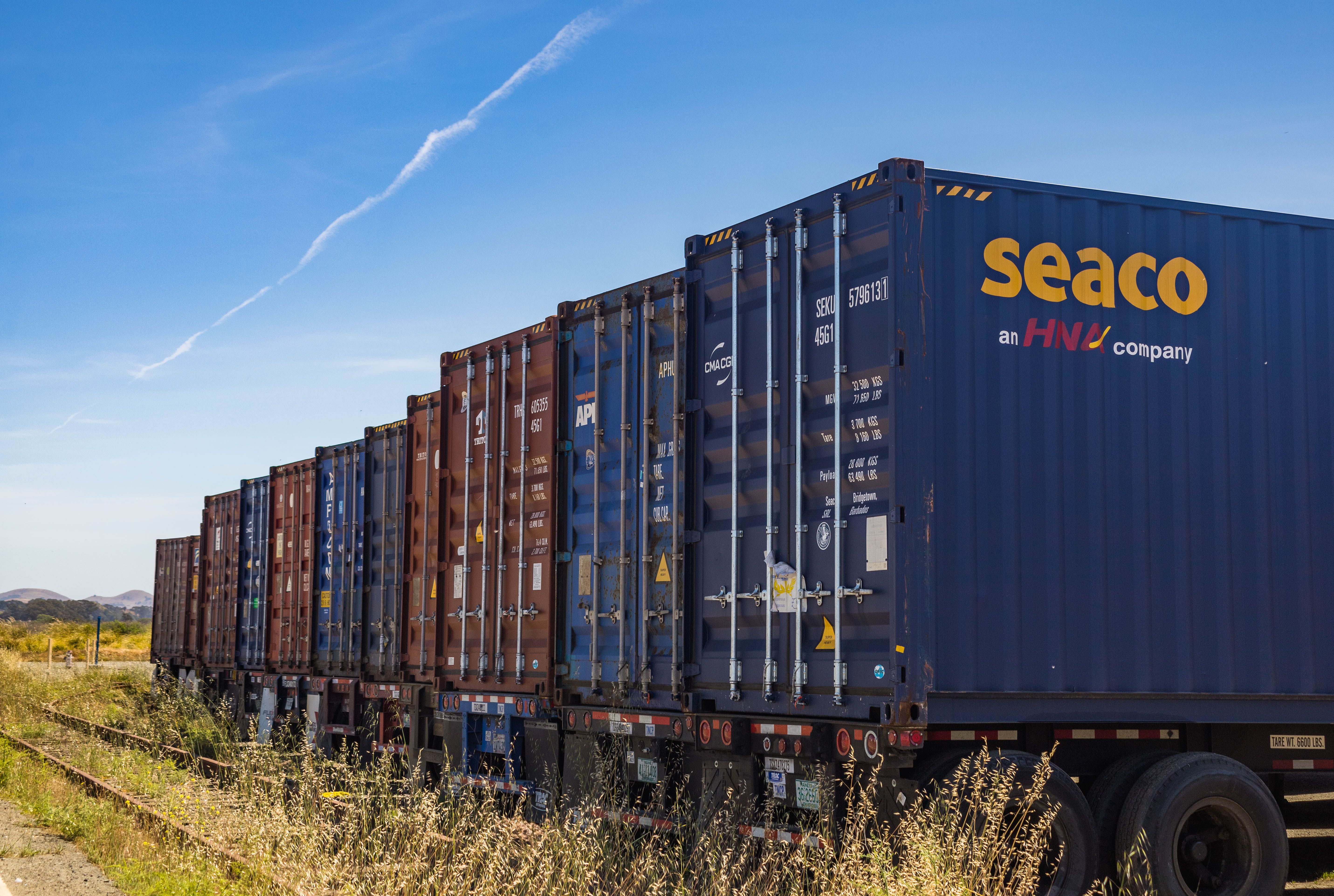 Logistics warehouse operations with trucks and cargo